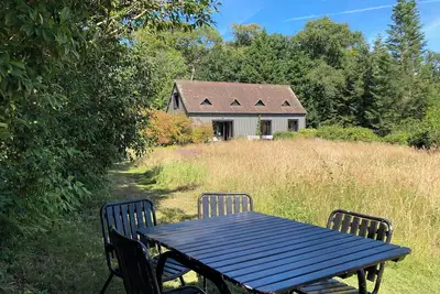 Image de Maison dans les bois au bord de la mer