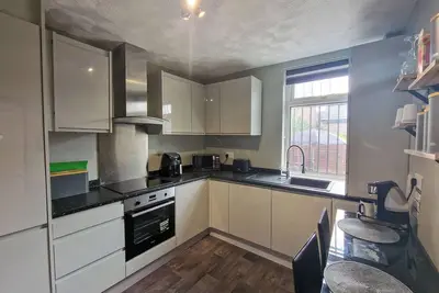 Image de City SuperHost 3bed close to Coop live and Etihad