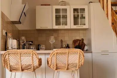 Image de Appartement Cosy - Balcon, Clim & Parking gratuit ombragé