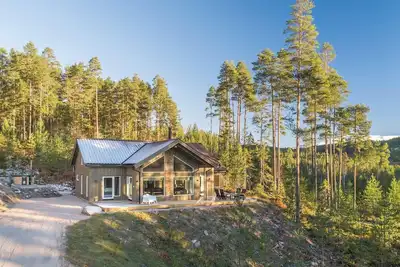 Image de This luxurious holiday home with breathtaking views is suitable for 6 to 8 people. Within walking distance of the center of Vrådal.