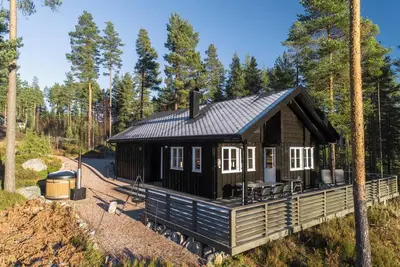 Image de This lovely holiday home with breathtaking views is suitable for 8 people. Located in the middle of nature and close to Vrådal center.