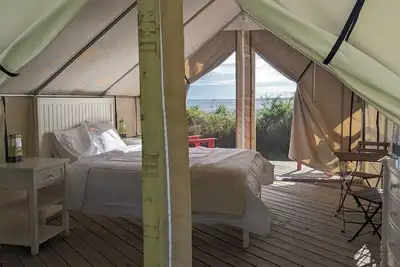 Image de Vue sur la baie-Tente-Espace sanitaire
