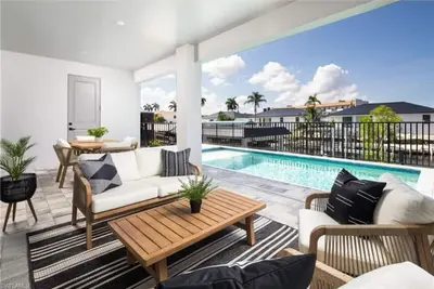 Image de Brand New Waterfront Retreat 5 min to Beach - Pool, Dock & Bay Views - 4br/3ba