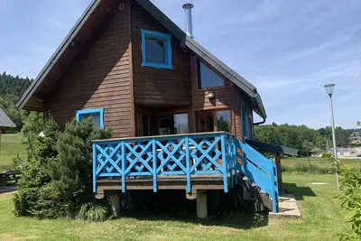 Image de Chalet '214 - Village Nordique' avec vue sur la montagne, piscine partagée et terrasse privée