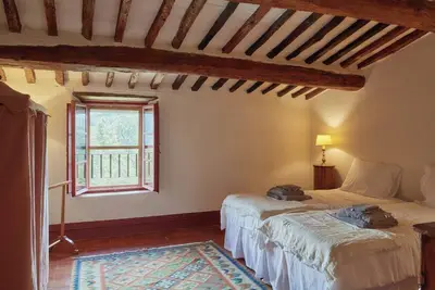 Image de Appartement « Casale Toscano avec vue sur jardin », jardin partagé, Wi-Fi, climatisation