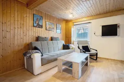 Image de Maison de vacances 'Am Darß - Leuchtturm' avec terrasse privée, jardin privé et Wi-Fi