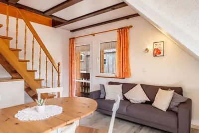 Image de Appartement '2- Ost' avec jardin privé, balcon et Wi-Fi