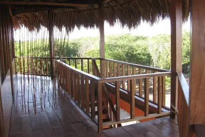 Image de Room with king size bed and shared bathroom, sea and garden view