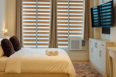 “Modern Cozy Unit with Balcony & Fast Wi-Fi – Near Sm Bicutan”