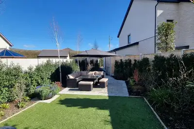 Image de Spacious 4-bedroom house with south facing garden in tranquil Greystones WiFi