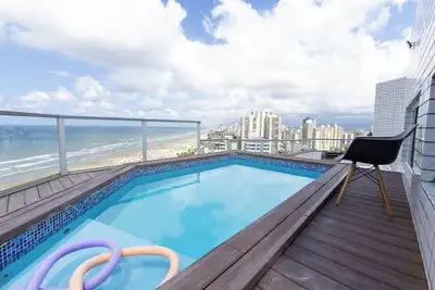 Image de Cobertura a beira mar com piscina e churrasqueira