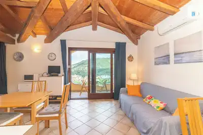 Image de Appartement 'Vista Mare Tiriddò' avec vue sur mer, piscine partagée et climatisation
