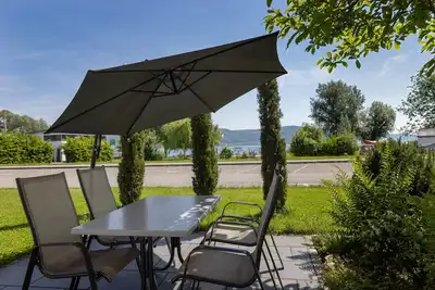 Image de Appartement 'Haldenhof, 58qm' avec vue sur lac, terrasse privée et Wi-Fi