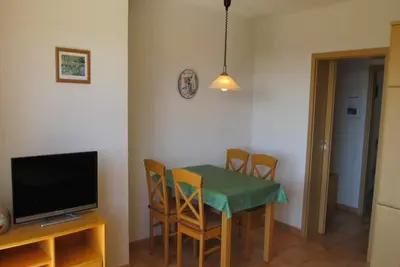 Image de Appartement '3, 57qm' avec vue sur le lac, balcon privé et Wi-Fi