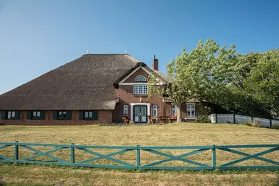 Image de Appartement \"Strandläufer\" avec terrasse et jardin partagés