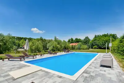 Image de Belle maison Ă Mala Ludina avec sauna
