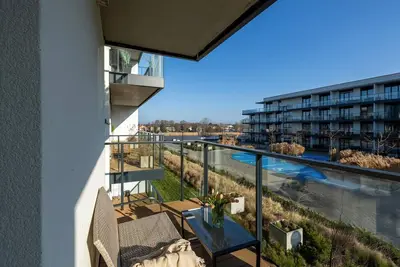 Image de Appartement avec vue sur la rivière, piscine