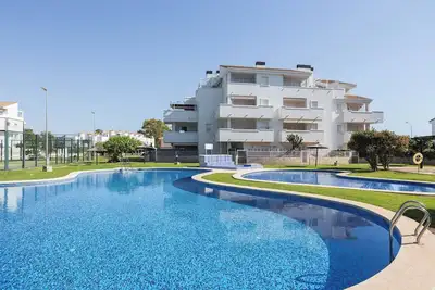 Image de Appartement 'Entre Olas 2' avec piscine partagée, terrasse privée et climatisation