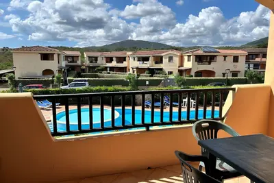 Image de Appartement 'Mirto' avec piscine partagée, terrasse privée et climatisation
