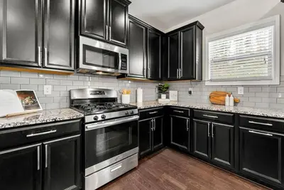 Image de Cozy 3-bedroom house in enjoyable Atlanta with WiFi and Ac