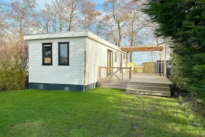 Image de A beautiful three bedroom chalet on the edge of our park with beautiful views of the meadows and Valkkoog.