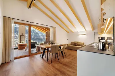Image de Appartement \"Federleicht\" avec vue sur les montagnes, terrasse privée et Wi-Fi