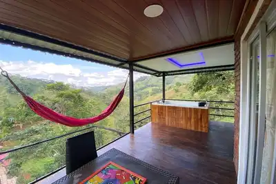 Image de Cabin in Norcasia Jacuzzi, spring water pool and extreme attractions option.