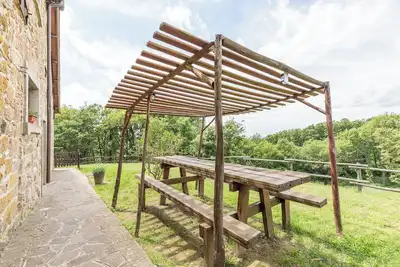 Image de Appartement 'Granaio' avec vue sur les montagnes, piscine partagée et Wi-Fi