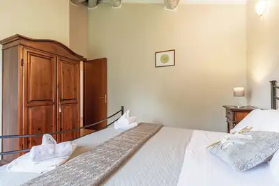 Image de Appartement 'La Loggia' avec vue sur les montagnes, piscine partagée et Wi-Fi