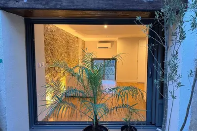 Image de Superbe studio Rénové dans maison médiévale avec terrasse et vue lagune de Thau
