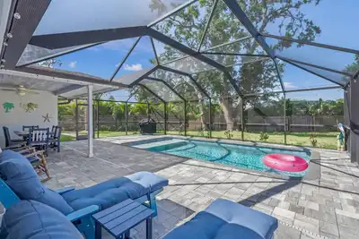 Image de Silver Palm Retreat w/ Pool, Game Room, Modern Kitchen – Walk to Gulf Gate Dining