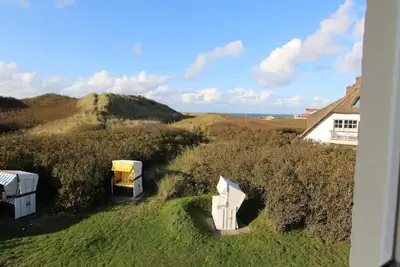Image de Bright vacation apartment on the upper and top floor of a thatched property