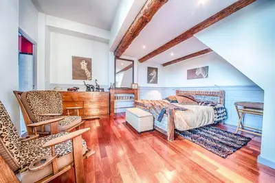 Image de Coeur de ville / familial et exotique 100m2 / 2 ch