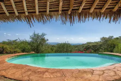 Image de An exclusive, family-friendly retreat with a mix of luxury tents and cottages.