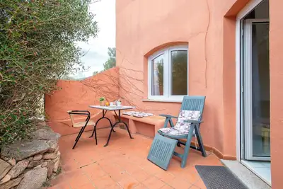 Image de Appartement 'Costarossa 110' avec vue sur la mer, terrasse privée et jardin privé