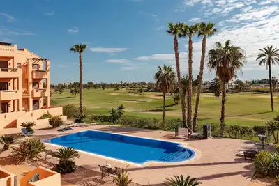 Image de Appartement 'Golf et Soleil' avec vue sur la mer, piscine partagée et climatisation