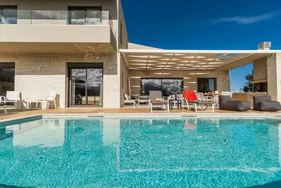 Image de Villa à Stiftianá avec 4 chambres à coucher, 10 couchages