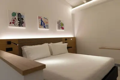Image de Studio en mezzanine Triple Supérieur avec balcon