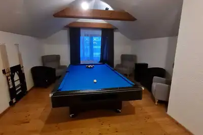 Image de Billiards and Swedish stove - the apartment for up to 11 people in a quiet location.