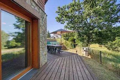 Image de Chalet 'Edliane' avec vue sur les montagnes, terrasse privée et Wi-Fi