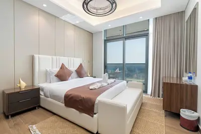 Image de High Floor 3br City View l King size Bed