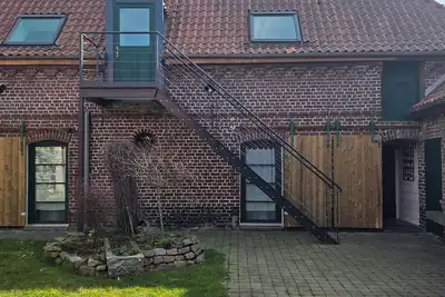 Image de Le gite le Rucher, vous accueille dans une ancienne ferme, à la frontière belge.