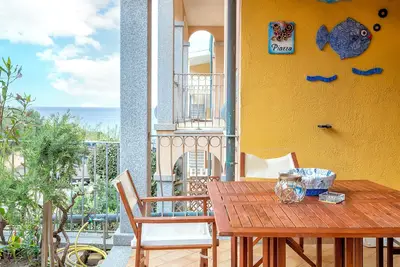 Image de Appartement 'L'Elicriso - Profumi Di Sardegna' avec vue sur mer, terrasse privée et climatisation