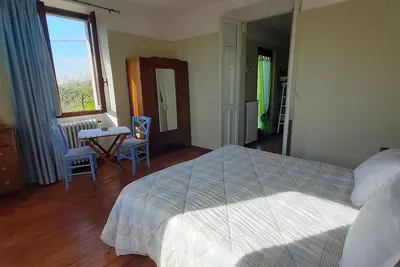 Image de Chambre d'hôtes \"Larice Rosso\" avec vue sur le lac, jardin partagé et Wi-Fi