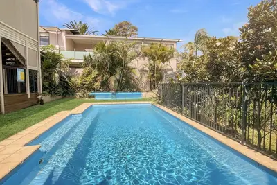 Image de Coastal Upper-Level Home with Pool Access
