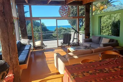 Image de Modern Kiwi family bach right on the beach. Private & pet friendly.