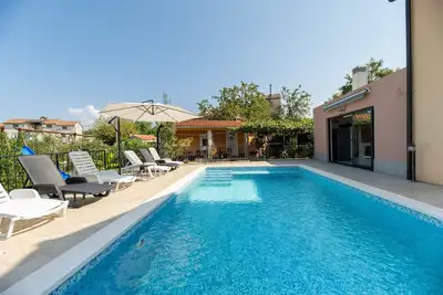Image de Two Charming 3-bedroom cottage with privat pool Ac, WiFi