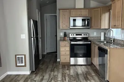 Image de Charming bungalow on legacy golf coarse next to potholes reservoir.