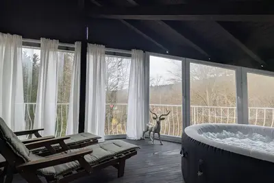Image de Cozy fireplace suite with private whirlpool & fireplace in the Wald-Villa-Schönau