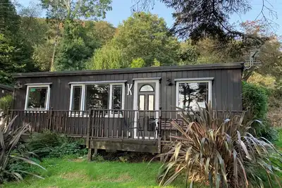 Image de Cosey detached Chalet with wonderful Estuary and Mountain Views.